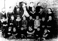 Sister Eugène with pupils at Marsh Lane Schoo